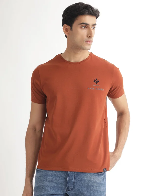 Men's Shirts with CollarsRare Rabbit Men's Castel Dark Rust Crew Neck Graphic Print Branded Half Sleeves T-Shirt Men's Shirts with CollarsRare Rabbit Men's Castel Dark Rust Crew Neck Graphic Print Branded Half Sleeves T-Shirt