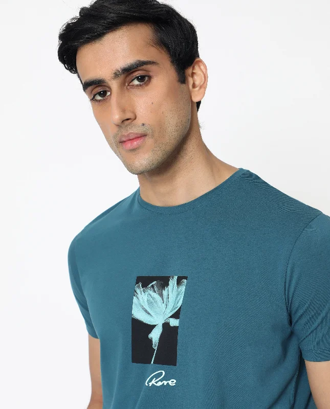 Men's Casual Shirts for Everyday WearRare Rabbit Men's Dixie Blue Crew Neck Floral Discharge Print Half Sleeves Slim Fit T-Shirt Men's Casual Shirts for Everyday WearRare Rabbit Men's Dixie Blue Crew Neck Floral Discharge Print Half Sleeves Slim Fit T-Shirt